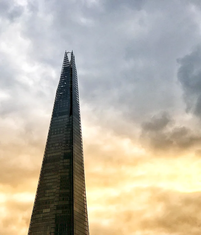 The Shard skyscraper in the City of London at sunset, viewed from below